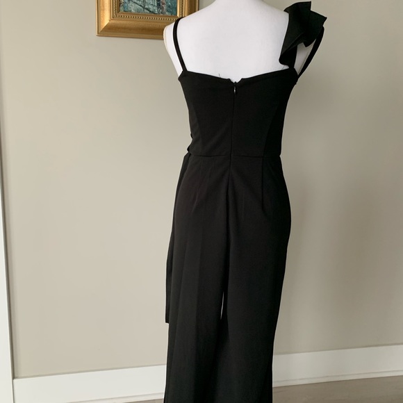 Unique and Classic jumpsuit with side slits - Picture 3 of 10